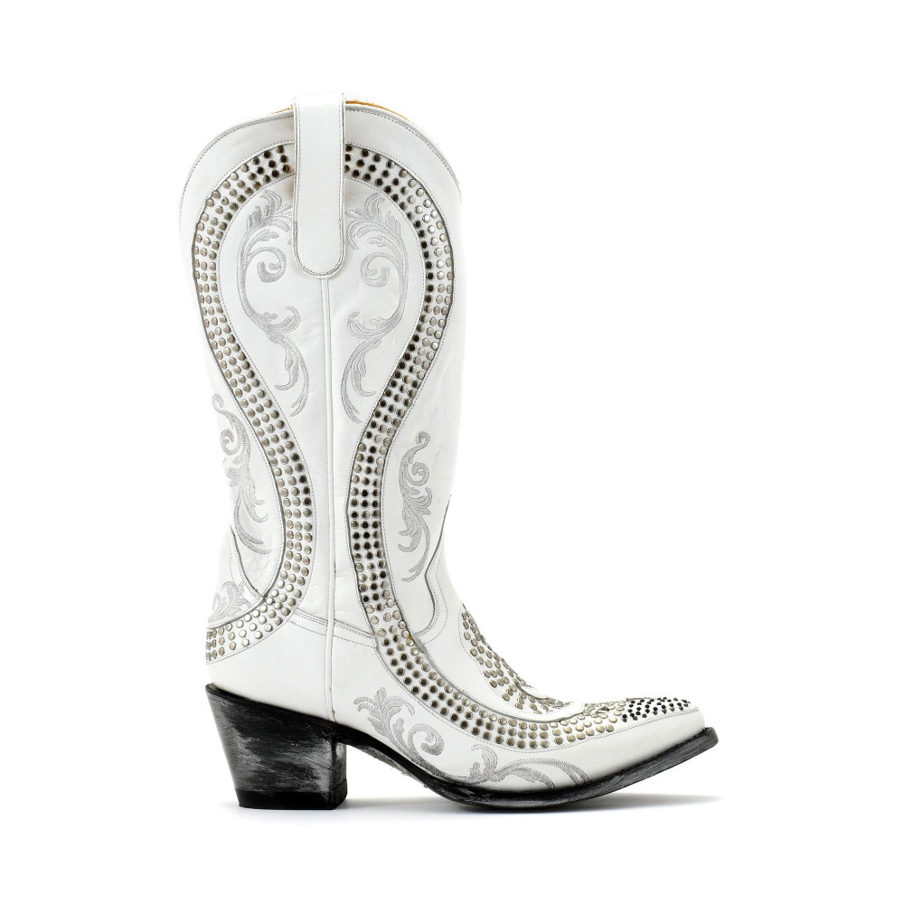 CORIUS SNAKE 13 WHITE BOTTES A BOUT POINTU AVEC CLOU
ET DECOUPE SERPENT
Hauteur totale du talon 6.5 cm
100% cuir de vachette