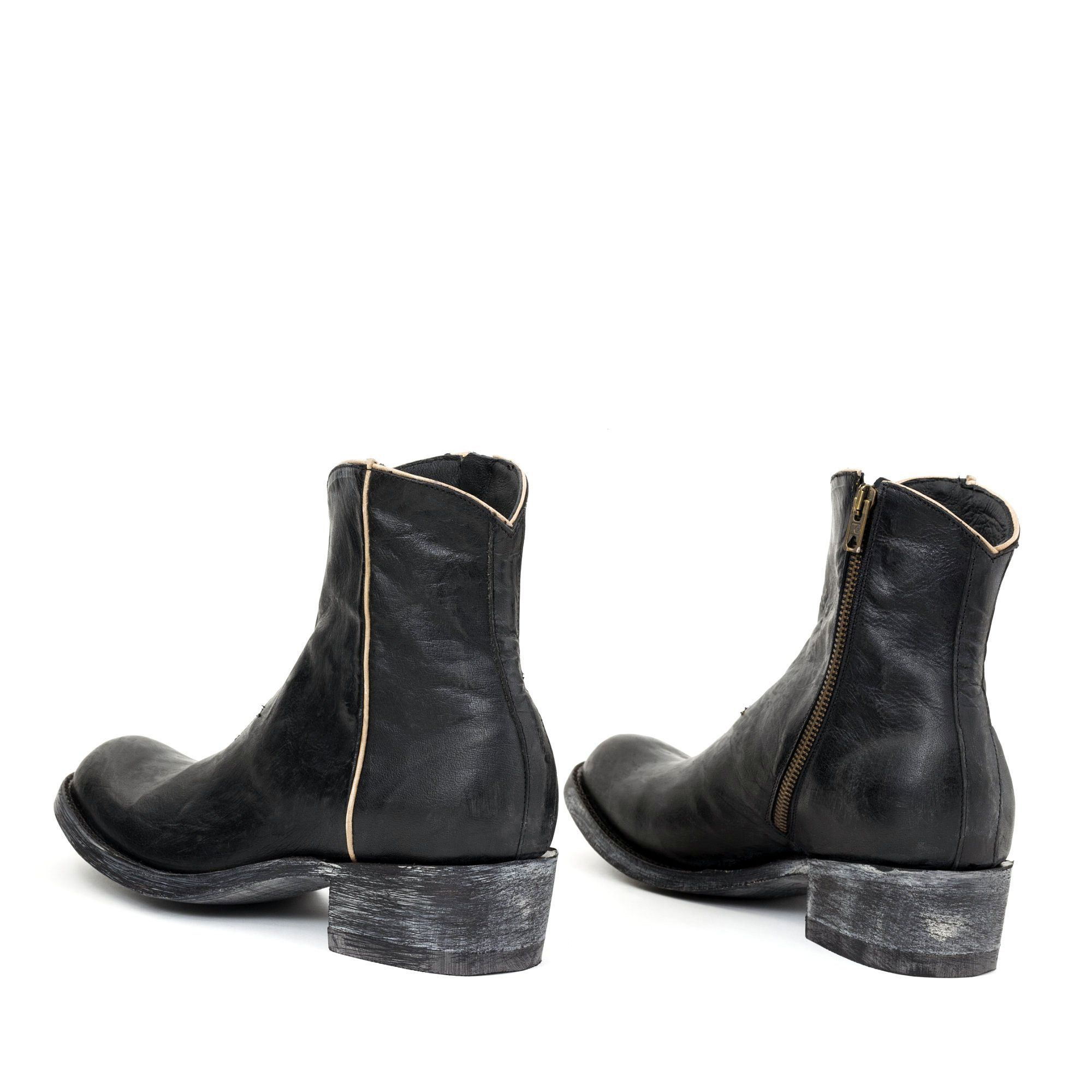 STAR BLACK / BONE ROUNDED TOE ANKLE BOOTS WITH STAR  AND SIDE ZIP CLOSURE  Total heel height 1.8 Inches  100% cow leather  Color