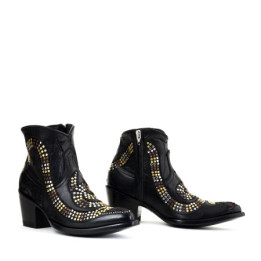 CORIUS SNAKE BLACK BOTTINES A BOUT POINTU&nbsp;AVEC CLOUS

ET DECOUPE SERPENT

Hauteur totale du talon 6.5 cm

100% cuir d